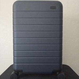 Away Navy Blue Rolling Suitcase